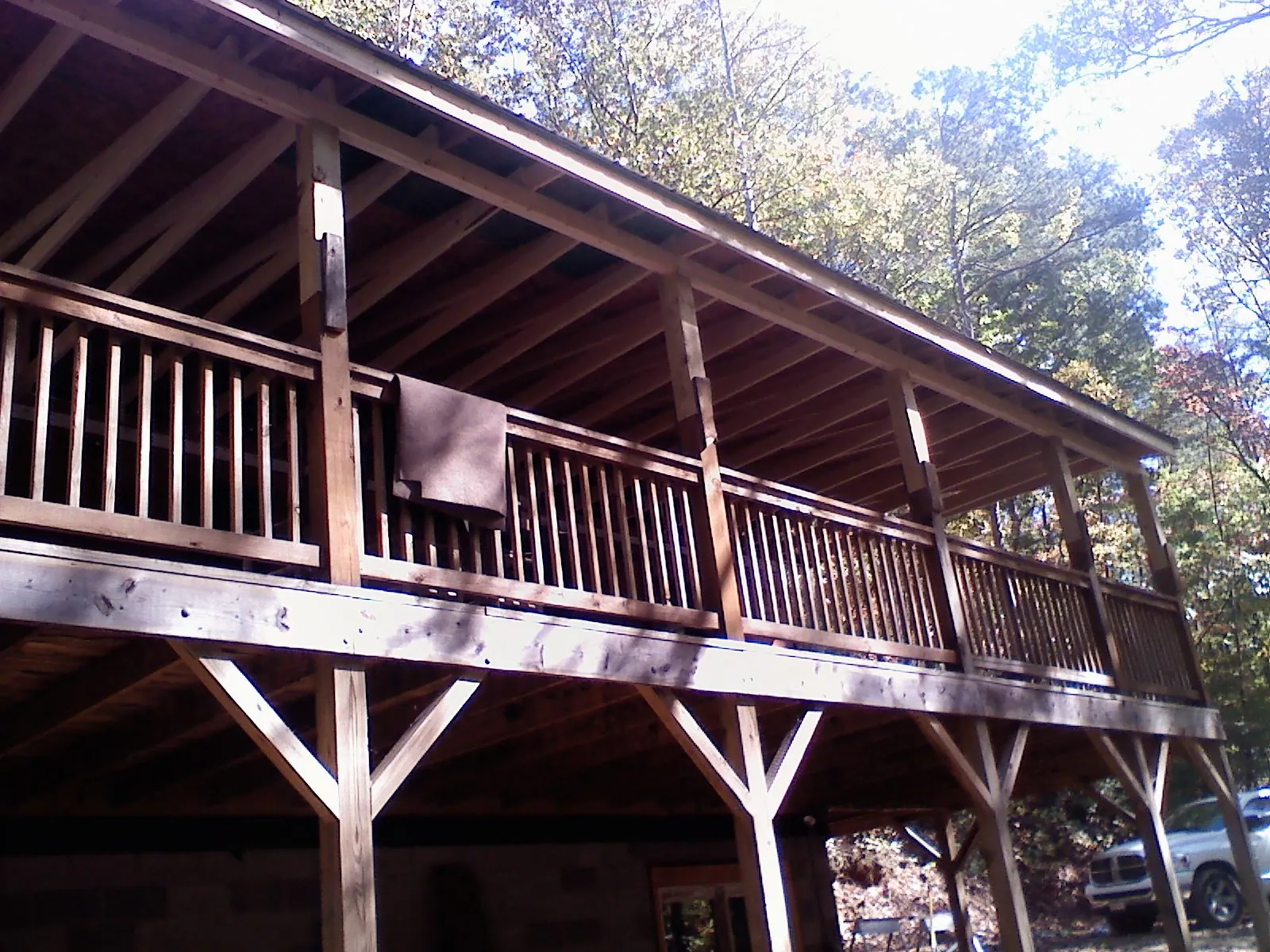 Timber framing under a new elevated porch and deck — Roof Leak Repair in Polaris by Roofing Brothers